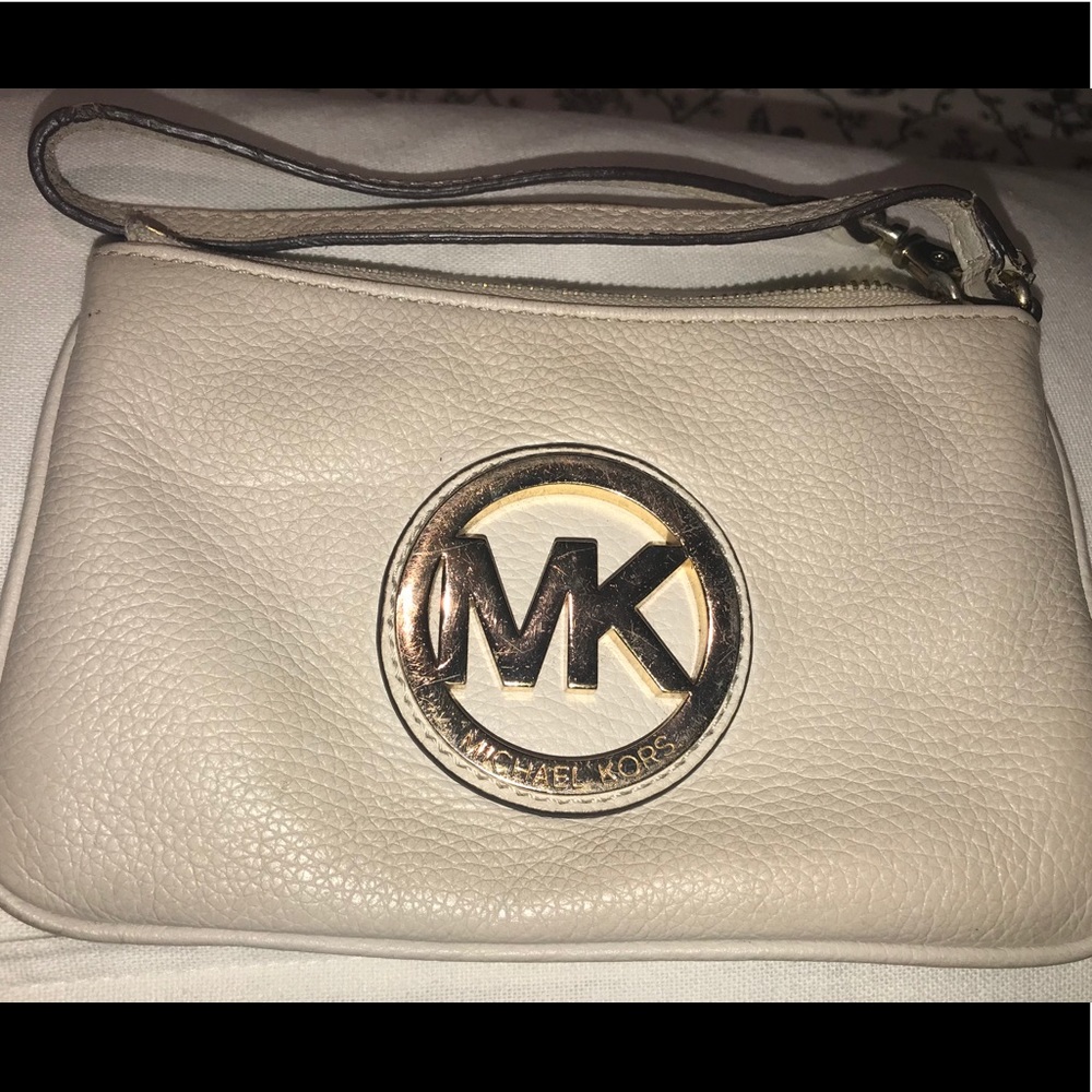Cream Michael Kors wristlet